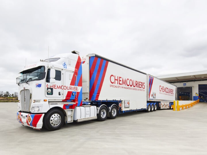 Hazardous Goods Transport - Chemcouriers - Chemcouriers B-Double driving out of depot