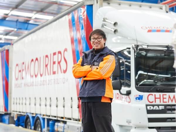 Owner Driver - Chemcouriers - Owner Driver standing in front of truck